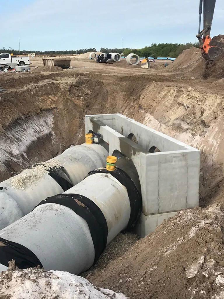Image a pre-cast pipe being installed