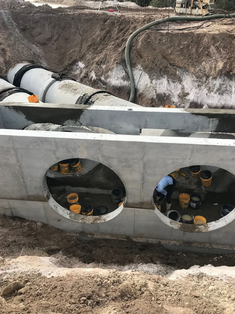 Image a pre-cast pipe being installed