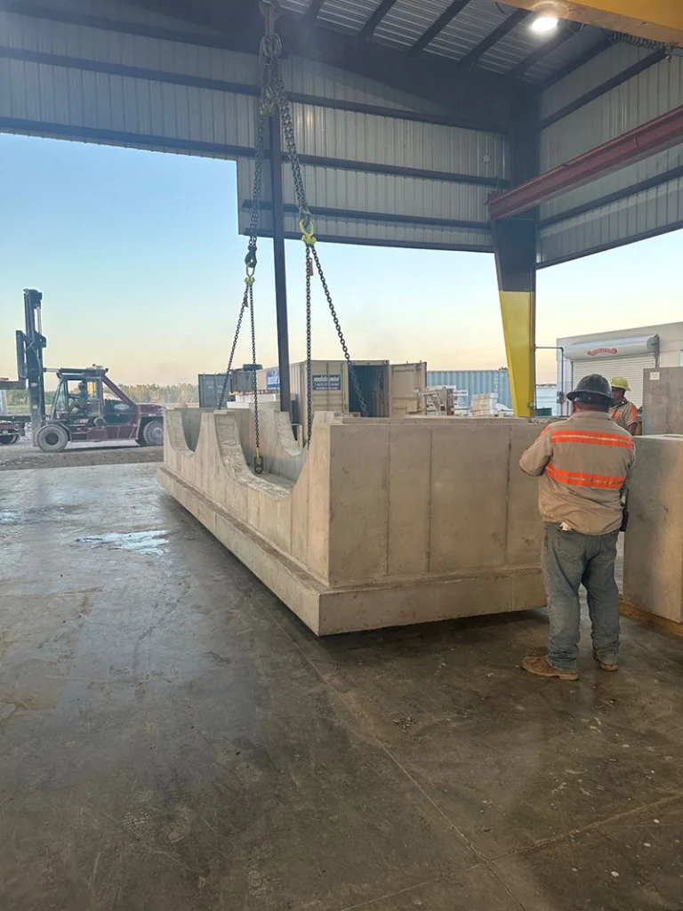 Image a pre-cast manhole being installed