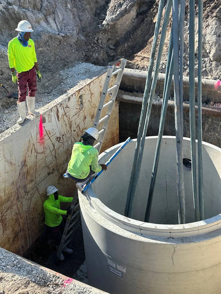 Image a pre-cast manhole being installed